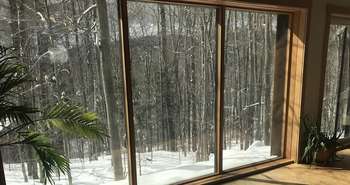 Low-E coatings on windows reflect heat and save energy during summer and winter