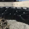 Basement foundation with exterior dimple membrane for water protection