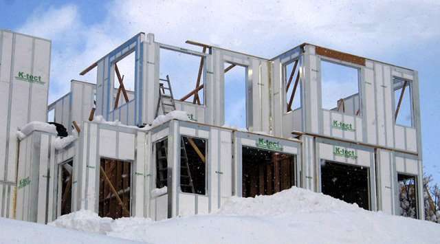 A building made from foam and steel structural insulated pane