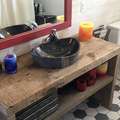 Recycled barn beams and a refinished clawfoot bathtub