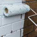 Repainting and refinishing brick facades