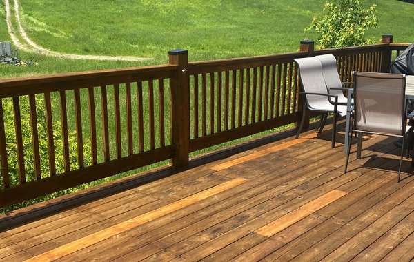 Freshly Stained Cedar Wood Deck after Renovating old Decking to Look Like New