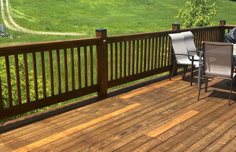 Freshly Stained Cedar Wood Deck after Renovating old Decking to Look Like New