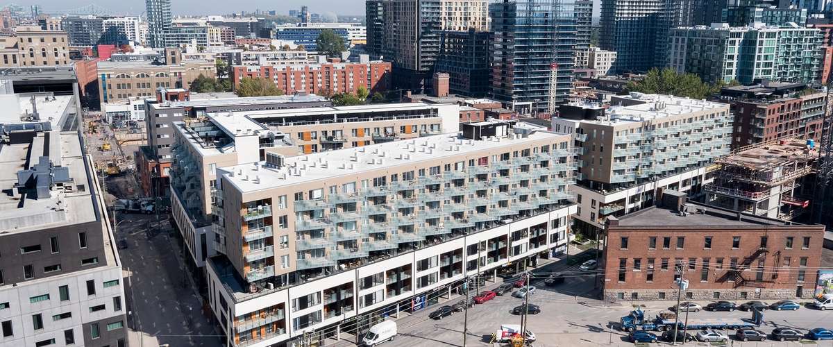 Mid-rise construction with reduced embodied carbon wood v concrete