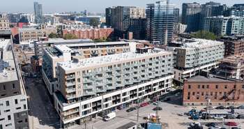 Mid-rise construction with reduced embodied carbon wood v concrete