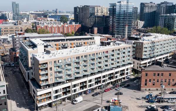 Mid-rise construction with reduced embodied carbon wood v concrete
