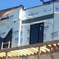 Tyvek home wrap left exposed to wind and UV rays
