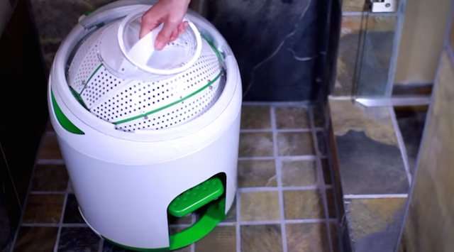 Manual powered foot pedal washing machine for doing laundry off-grid