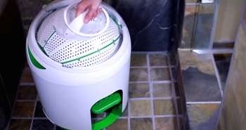 Manual powered foot pedal washing machine for doing laundry off-grid