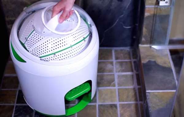 Manual powered foot pedal washing machine for doing laundry off-grid