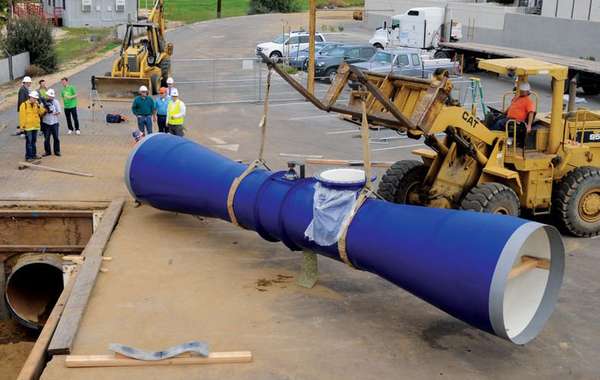 the installation of a LucidPipe power generator via Lucid Energy