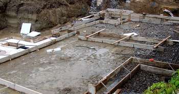 Slab on grade or a foundation and basement?