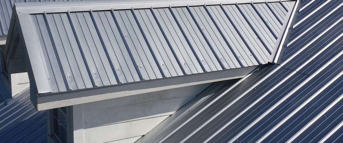 Metal roof with solar panels