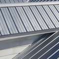 Metal roof with solar panels