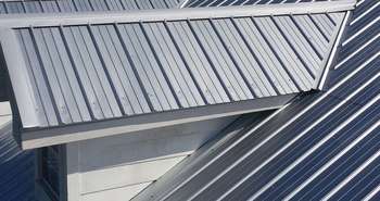 Metal roof with solar panels