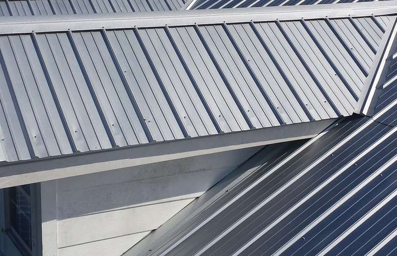 Metal roof with solar panels