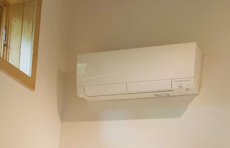 Ductless mini-split air source heat pump installed in a LEED certified PH Home
