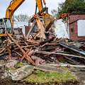 Deconstructing homes so building materials can be recyled and reused.