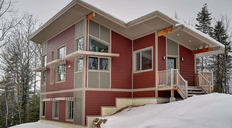 Passively-heated off-grid LEED house in Low, Quebec