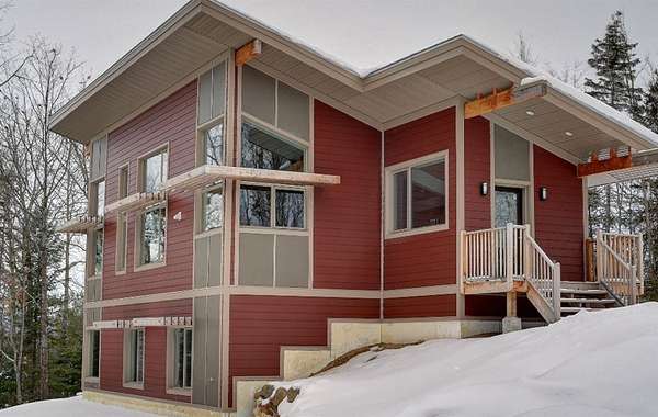 Passively-heated off-grid LEED house in Low, Quebec