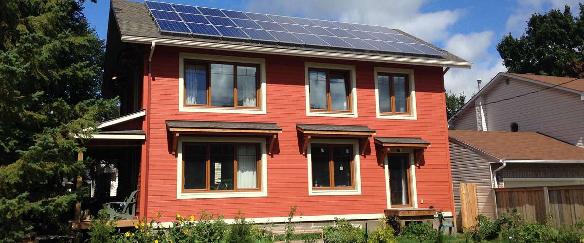 Roof top solar panels on a Passive House certified home - Image © Mike Reynolds