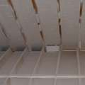 An attic with 'insulating paint' which doesn't insulate