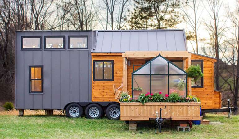 Mobile tiny house with attached greenhouse