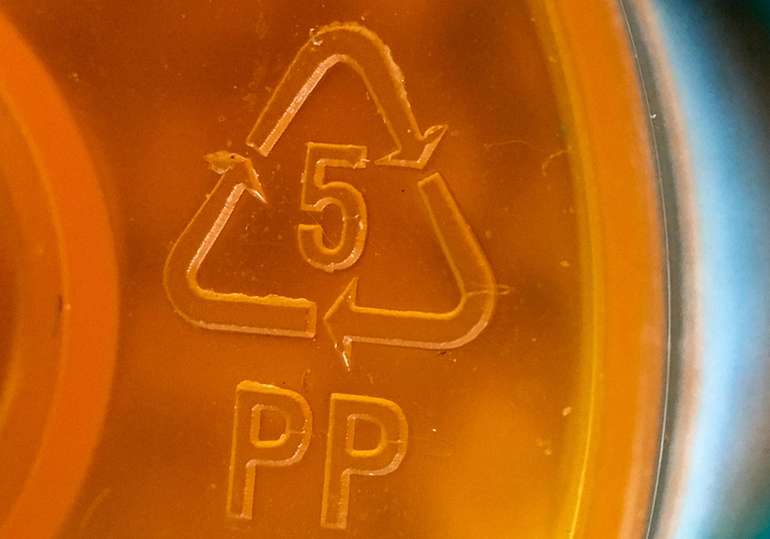 check for a recycling symbol on plastic items to see which are recyclable 