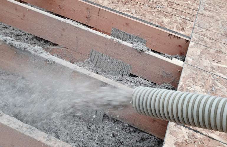 How much loose blown cellulose roof insulation is too much?