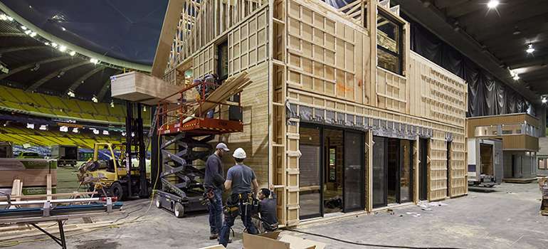 Eco home LEED prefab kit house with dense packed cellulose walls 