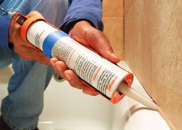 Sealing around baths with an acrylic caulk like this may well cause premature seal failure