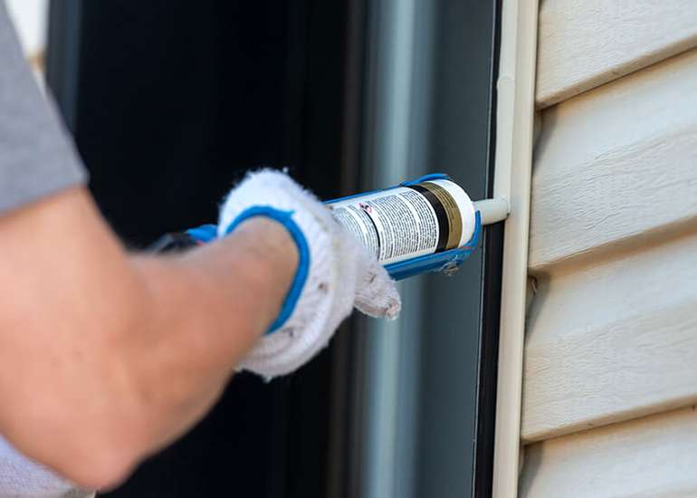 External caulk application during a weatherproof window installation