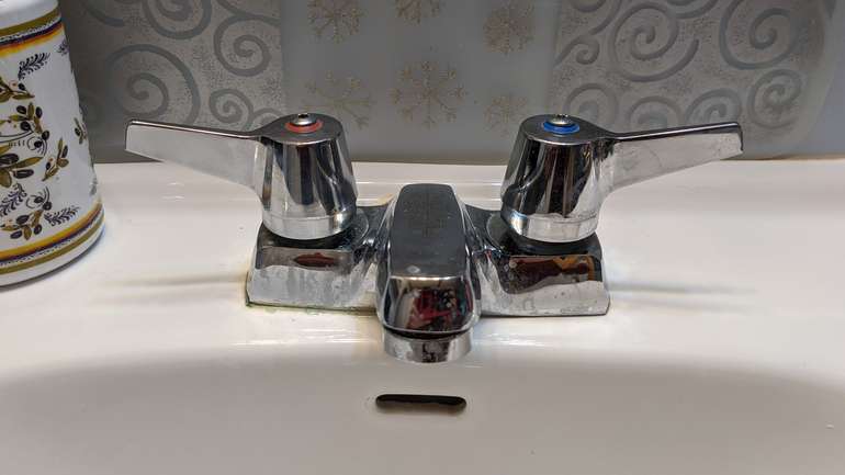 An older style leaking faucet is easy enough to repair