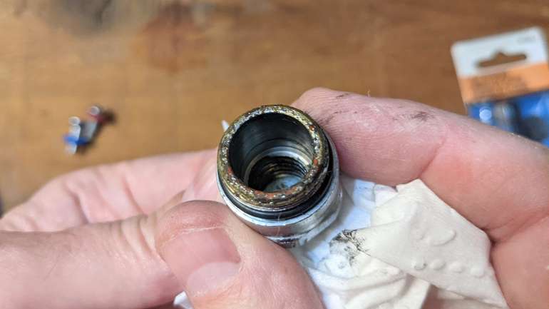 Inspect the bore of the faucet cartridge for damage and clean it out to prevent leaks