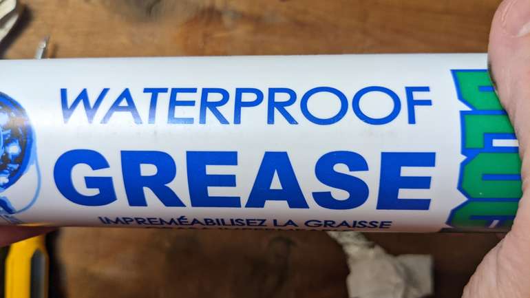 Waterproof grease can be used where you don't drink the water out of the tap, otherwise use food grade silicone grease