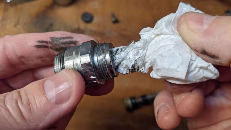 You really want to get all the hard grease and grit out of the bore of the tap cartridge
