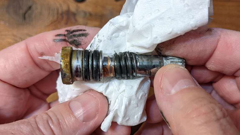 Carefully clean off and inspect the rubber o rings in the tap cartridge