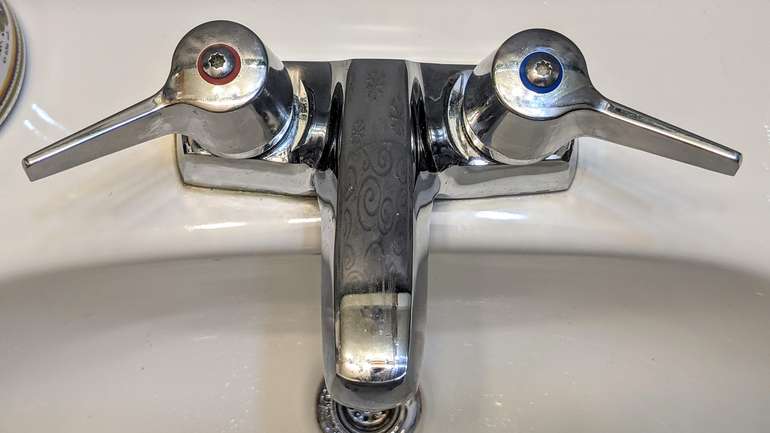 This is where the DIY repaired quarter turn faucet levers are when the taps are fully closed