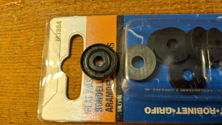 A new tap washer compared to the old one - no wonder that faucet was dripping!