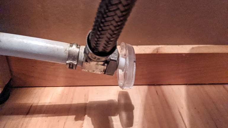 Quarter turn water isolation tap on a toilet installation