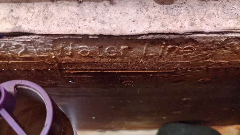 The correct water level in the toilet cistern is usually marked with a line