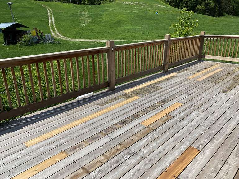 Flipping old cedar deck boards to extend the life of a deck is a good idea