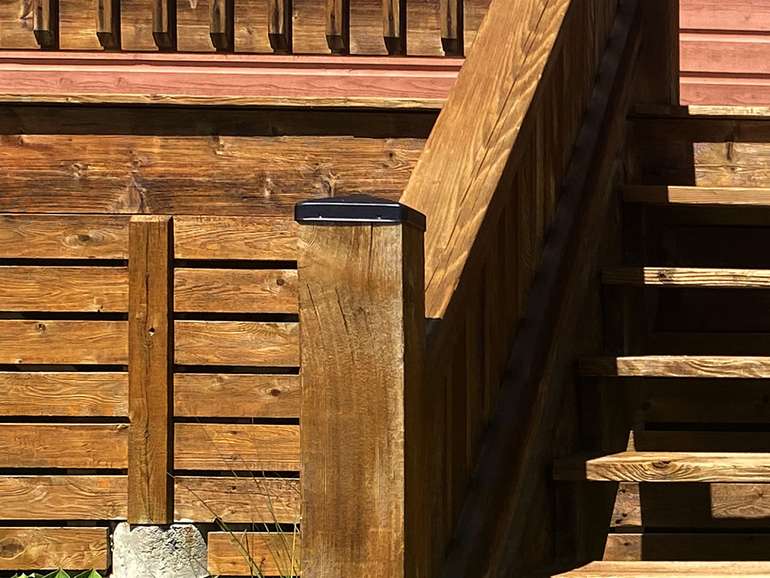 Metal deck post caps extend deck life and help prevent cedar posts from rotting