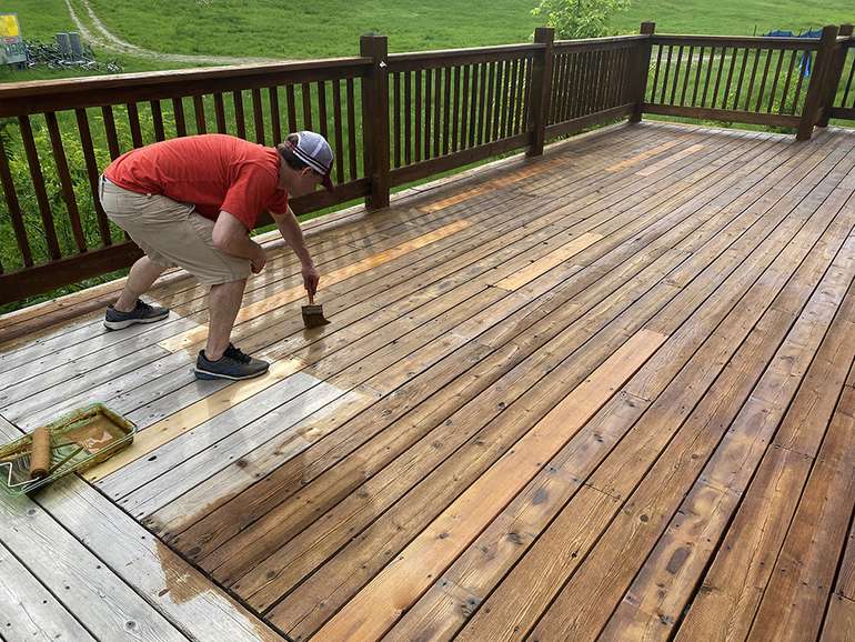 How to apply deck stain with a brush in the gaps between decking planks when making cedar decks look like new
