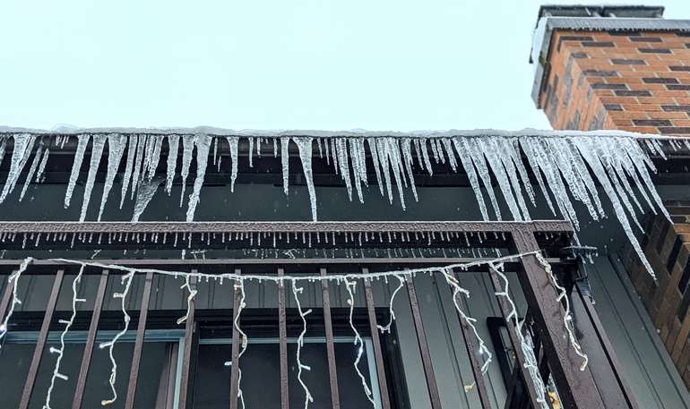 Ice Dams put a significant load on gutters and cause dangerous icicle build up on homes