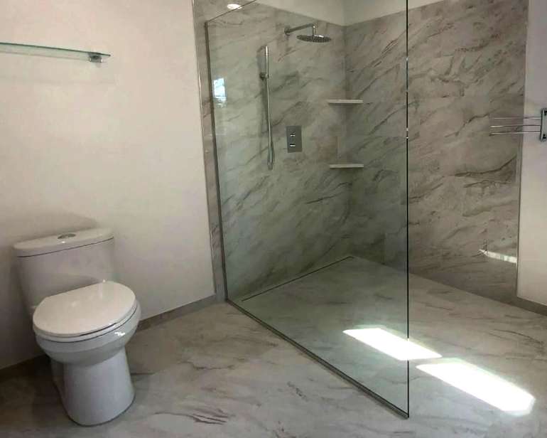 Curbless shower for easy wheelchair access