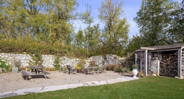 The remains of an 1800's barn provide an outside gathering place on the property